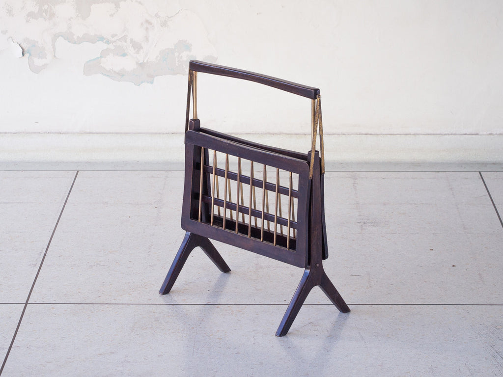 Cesare Lacca | Revisteiro Articulado