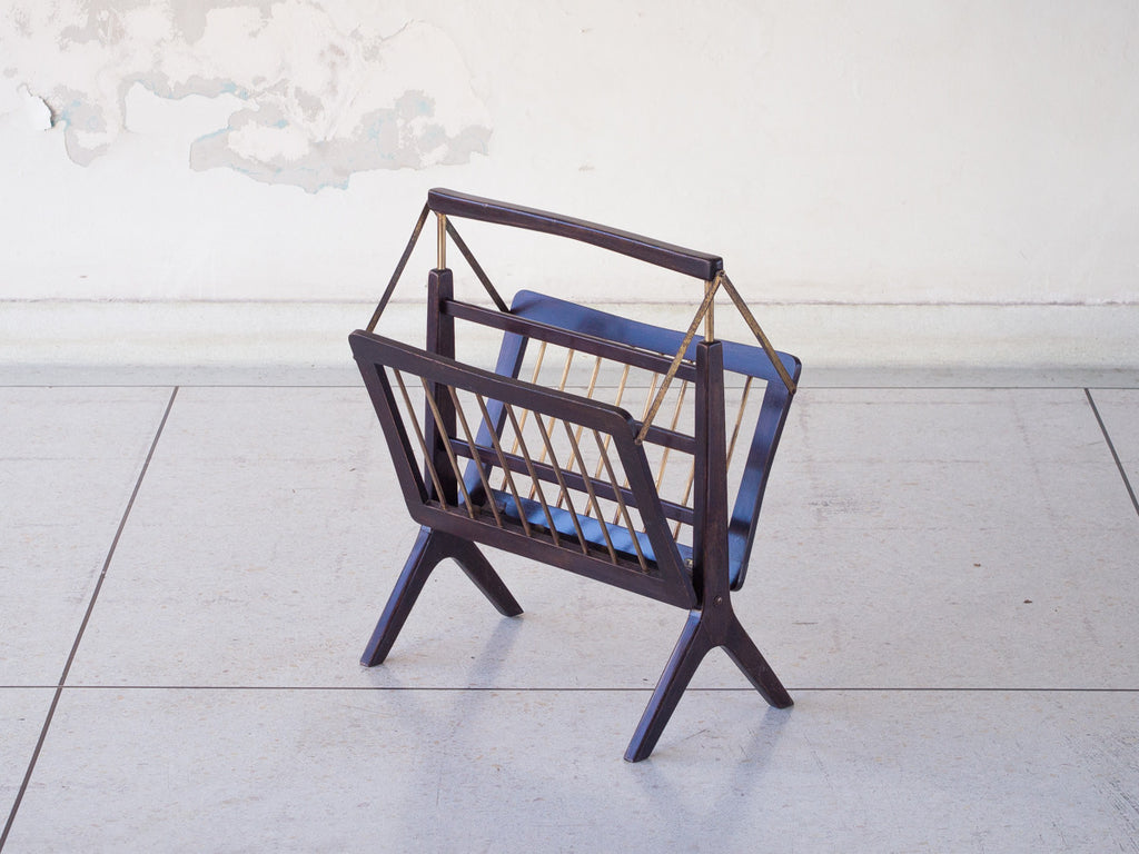 Cesare Lacca | Revisteiro Articulado