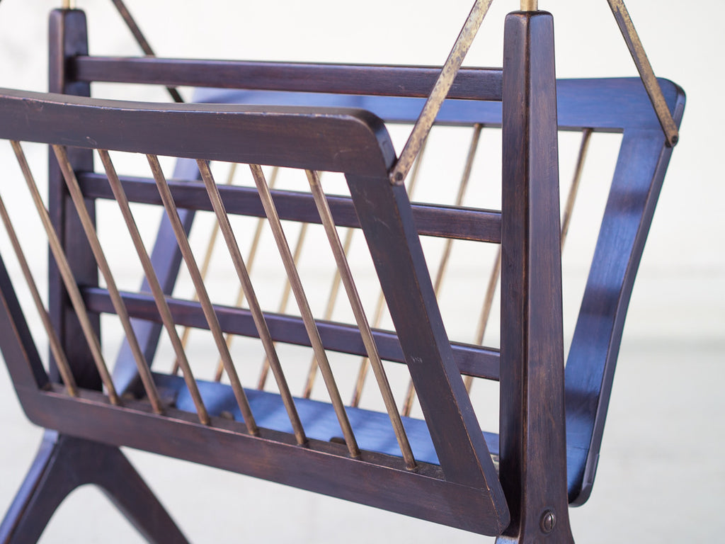 Cesare Lacca | Revisteiro Articulado