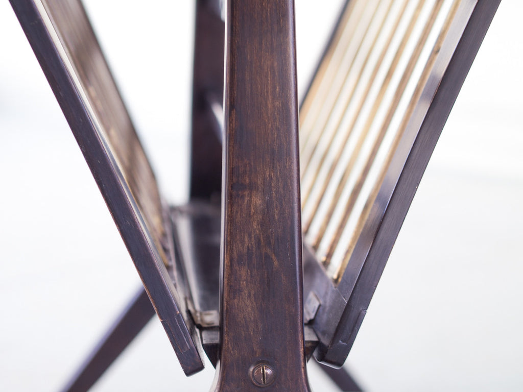 Cesare Lacca | Revisteiro Articulado