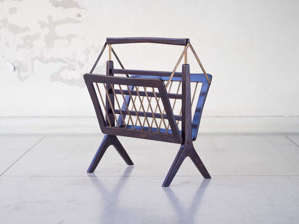 Cesare Lacca | Revisteiro Articulado