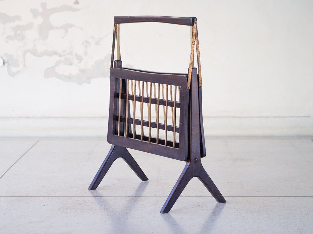 Cesare Lacca | Revisteiro Articulado