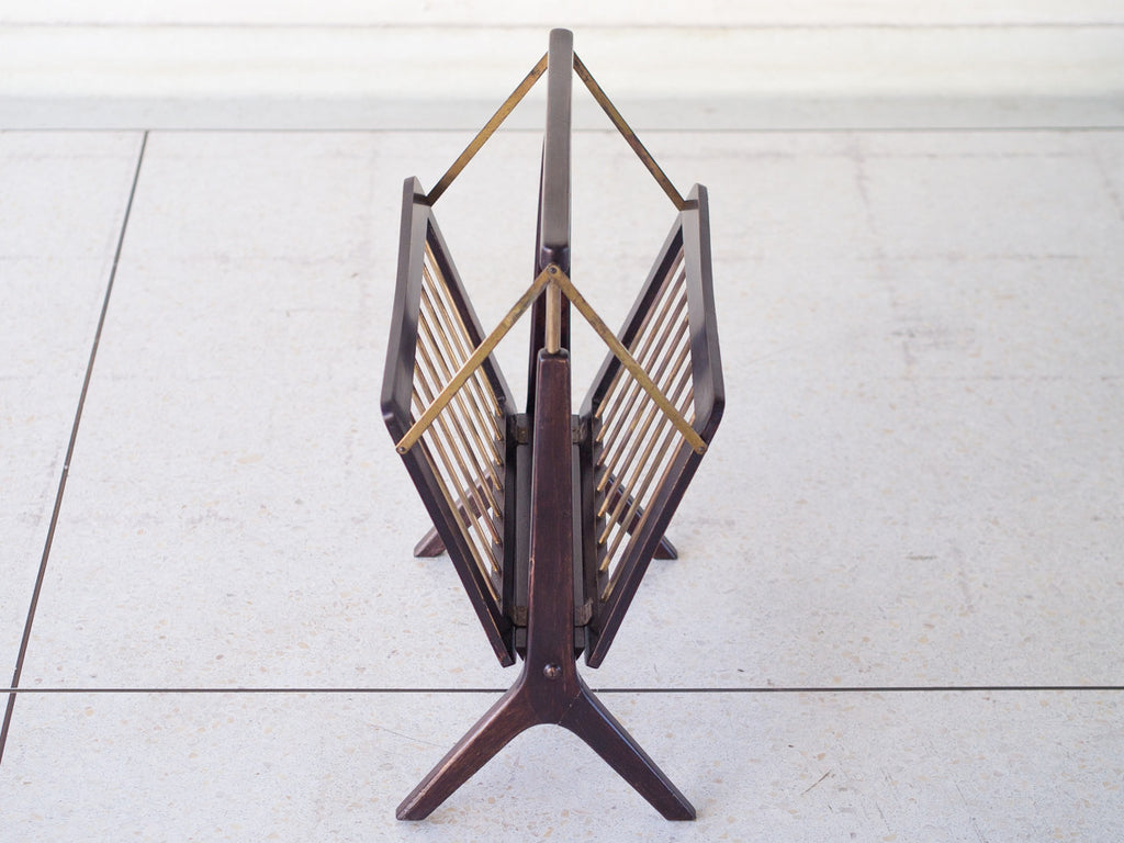 Cesare Lacca | Revisteiro Articulado